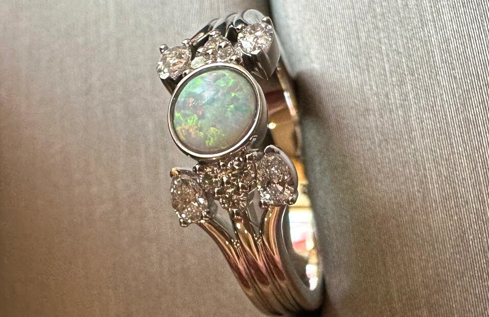 Ornate opal ring with heirloom-style detailing