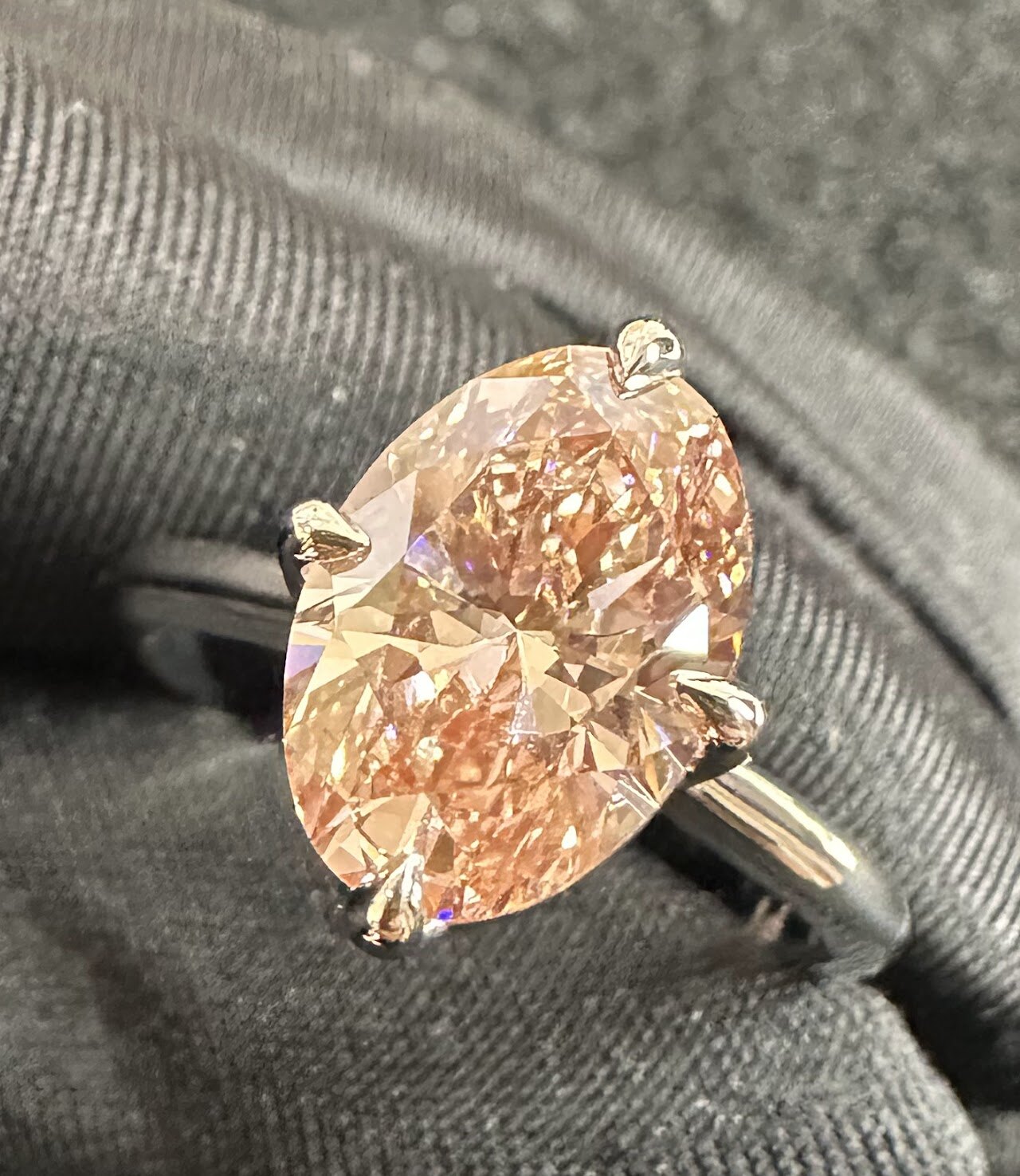Oval statement ring with warm center stone