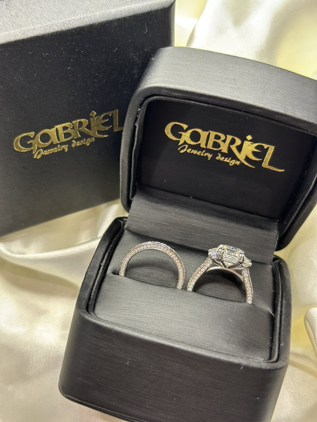 Finished custom engagement ring and wedding band in Gabriel Jewelry Designs box